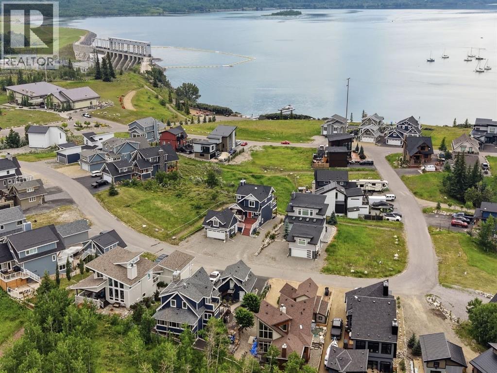 419 Cottageclub Cove, Rural Rocky View County, Alberta  T4C 1B4 - Photo 5 - A2294510