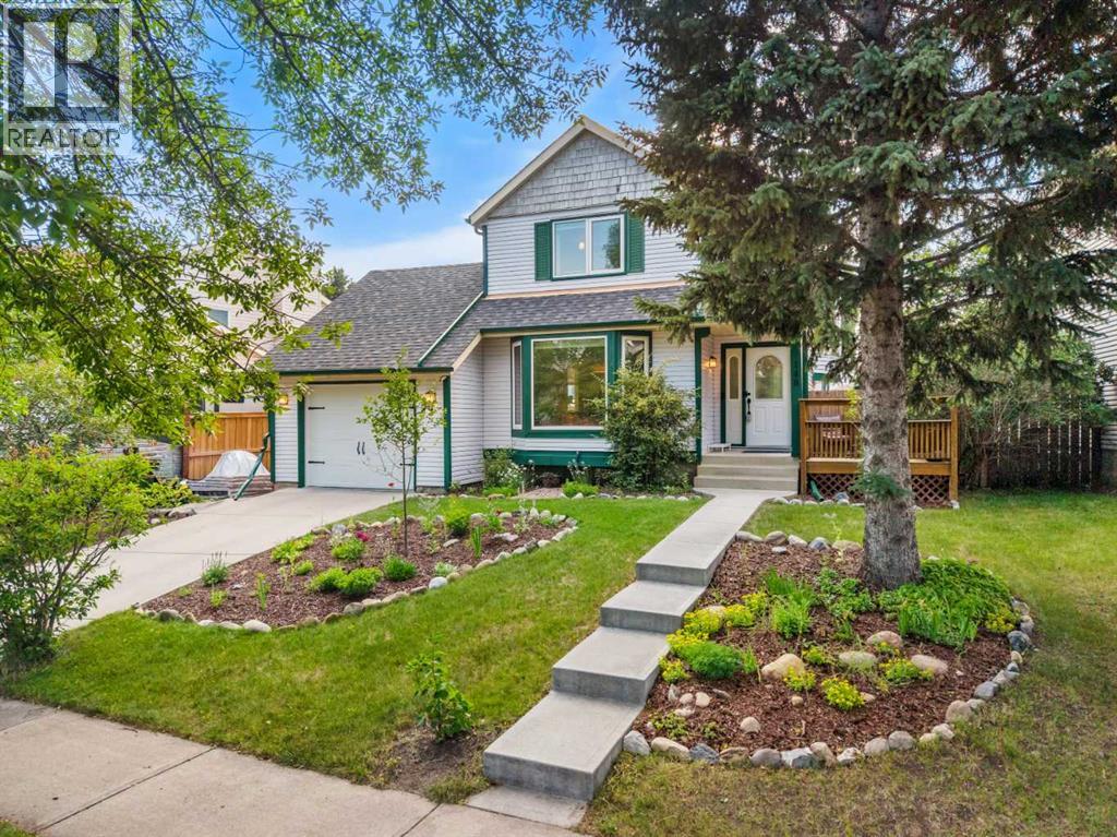 148 Woodridge Drive SW, Calgary, Alberta  T2W 5M2 - Photo 1 - A2330653