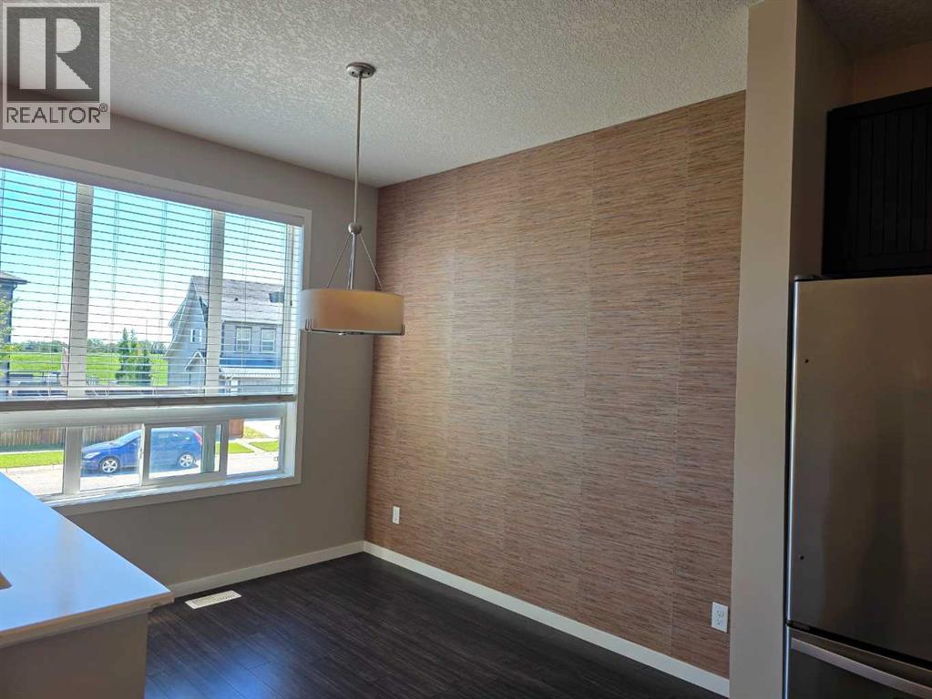 656 Copperpond Boulevard SE, Calgary, Alberta  T2Z 5B9 - Photo 6 - A2282104