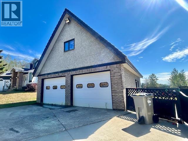 5516 Minnaker Crescent, Fort Nelson, British Columbia  V0C 1R0 - Photo 4 - R3148654