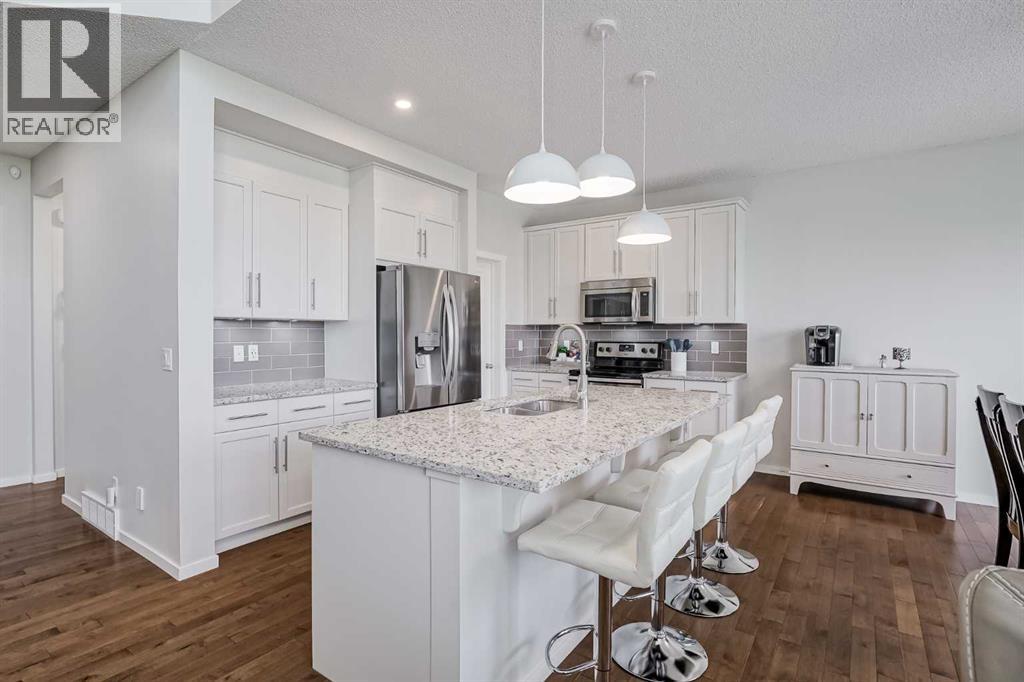 225 Kingsmere Cove SE, Airdrie, Alberta  T4A 0S1 - Photo 4 - A2320571