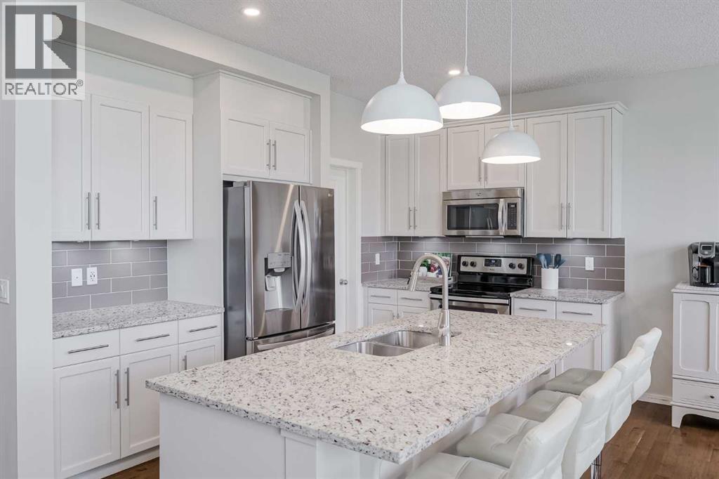 225 Kingsmere Cove SE, Airdrie, Alberta  T4A 0S1 - Photo 5 - A2320571