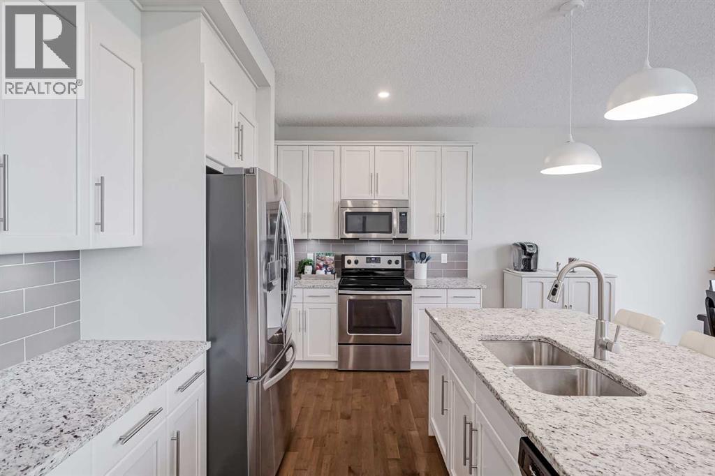 225 Kingsmere Cove SE, Airdrie, Alberta  T4A 0S1 - Photo 7 - A2320571