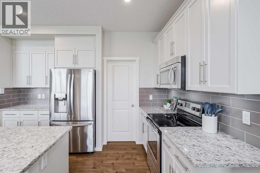 225 Kingsmere Cove SE, Airdrie, Alberta  T4A 0S1 - Photo 8 - A2320571
