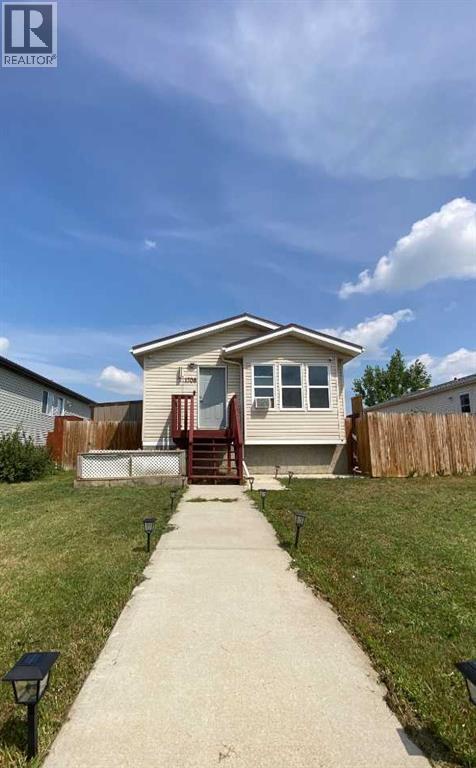 1708 2 Avenue E, Brooks, Alberta  T1R 1K3 - Photo 2 - A2331049