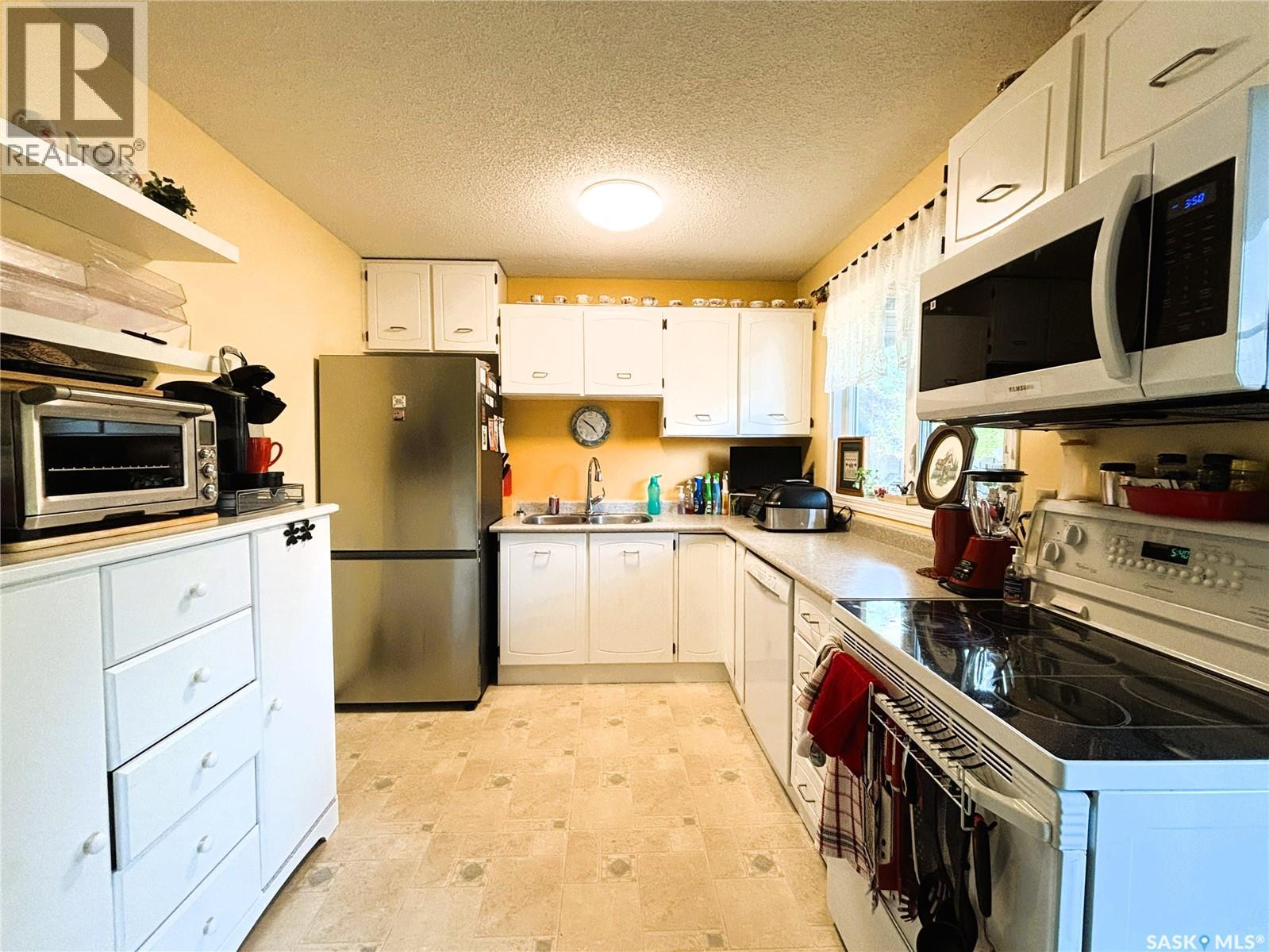 127 1128 Mckercher Drive, Saskatoon, Saskatchewan S7H 4Y7 - Photo 7 - SK043401