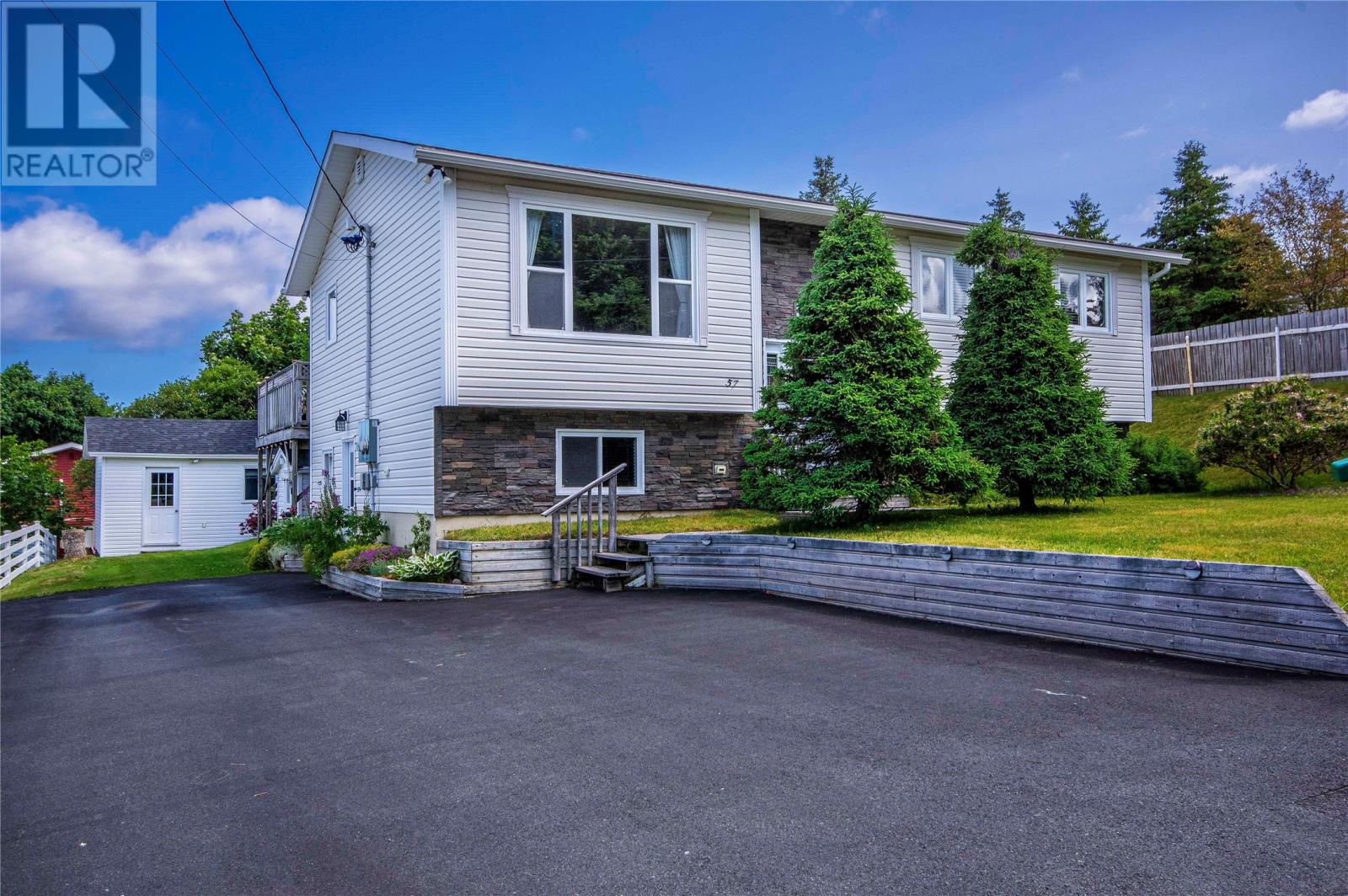 Welcome to 57 Cabot Road, located in beautiful Chamberlains, Conception Bay South. This well-cared-for split-entry home offers a fantastic opportunity for families, first-time buyers, or those looking for flexible living arrangements in a convenient and sought-after location. The main floor features three bedrooms, a modern updated kitchen, spacious living areas, and great natural light throughout. The home has seen important upgrades over the years, including kitchen cabinets, windows, and exterior doors, giving buyers peace of mind while still offering room to make the space their own. The basement is currently being used as part of the main unit, but could easily be converted back into a self-contained one-bedroom apartment with ground-level entry. This would be ideal for rental income, extended family, or elderly family members looking for added independence while staying close to home. Outside, the property continues to impress with a beautifully manicured yard, a large 16’ x 22’ storage shed, plus an additional storage shed for all your tools, toys, and seasonal items. Conveniently located close to Topsail Beach, Manuels Access Road, downtown CBS, walking trails, schools, shopping, and many other great amenities Conception Bay South has to offer. As per Seller’s Direction, there will be no conveyance of any written signed offers prior to 5:00 PM on July 29. All offers are to remain open for acceptance until 10:00 PM that same day. (id:48254)