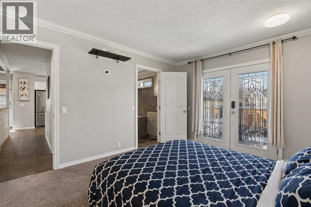 8011 Huntington Street NE, Calgary, Alberta  T2K 5B8 - Photo 22 - A2321930