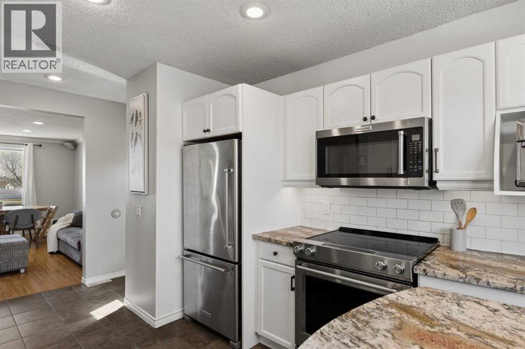 8011 Huntington Street NE, Calgary, Alberta  T2K 5B8 - Photo 16 - A2321930