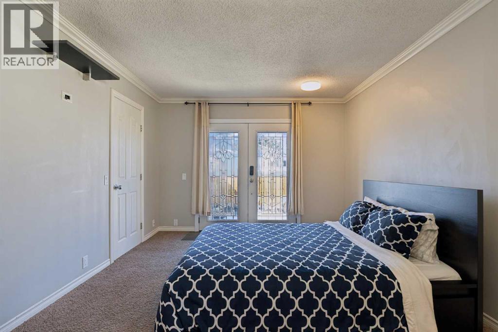 8011 Huntington Street NE, Calgary, Alberta  T2K 5B8 - Photo 21 - A2321930