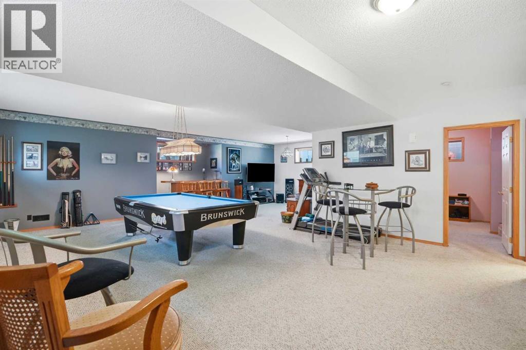 164 Sunterra Heights, Cochrane, Alberta  T4C 1W7 - Photo 28 - A2328025