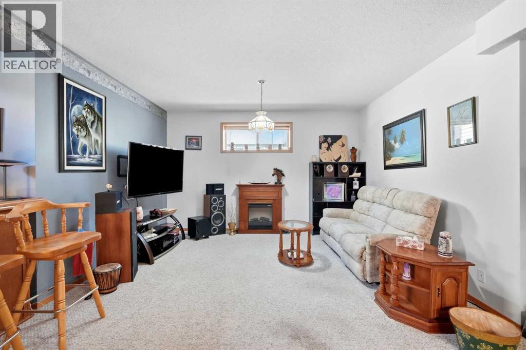 164 Sunterra Heights, Cochrane, Alberta  T4C 1W7 - Photo 33 - A2328025