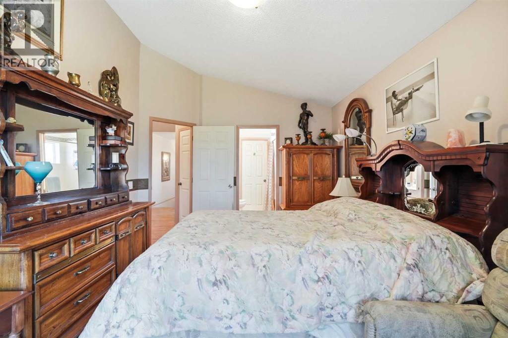 164 Sunterra Heights, Cochrane, Alberta  T4C 1W7 - Photo 23 - A2328025