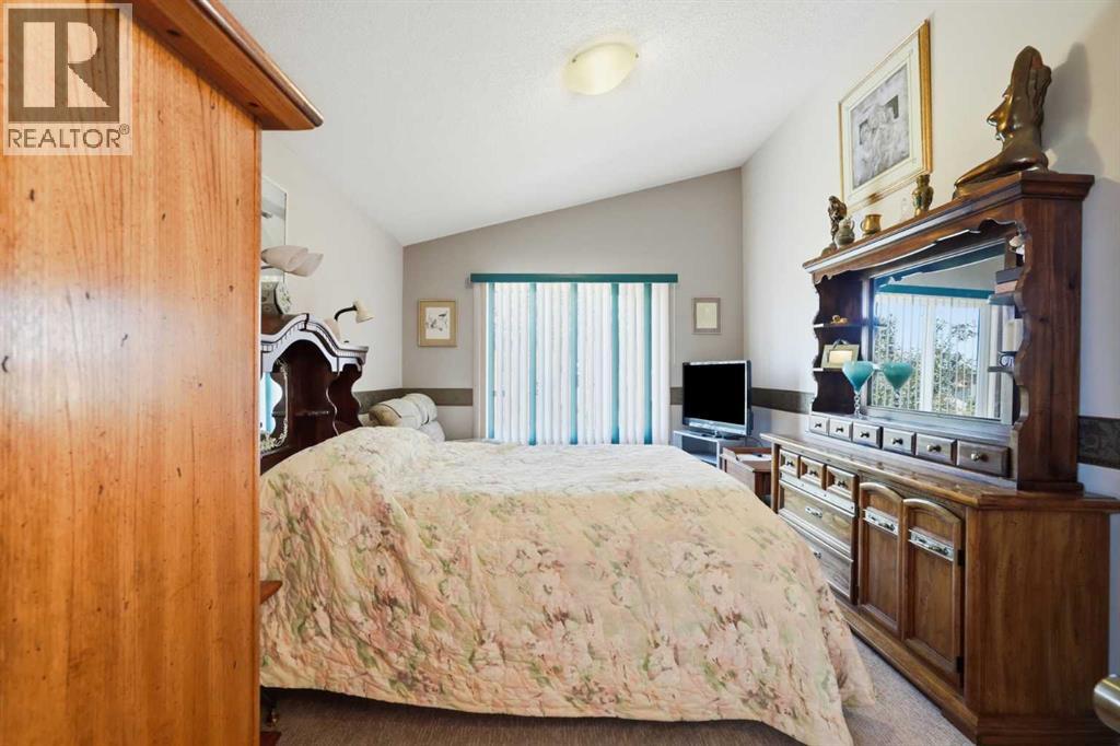 164 Sunterra Heights, Cochrane, Alberta  T4C 1W7 - Photo 22 - A2328025