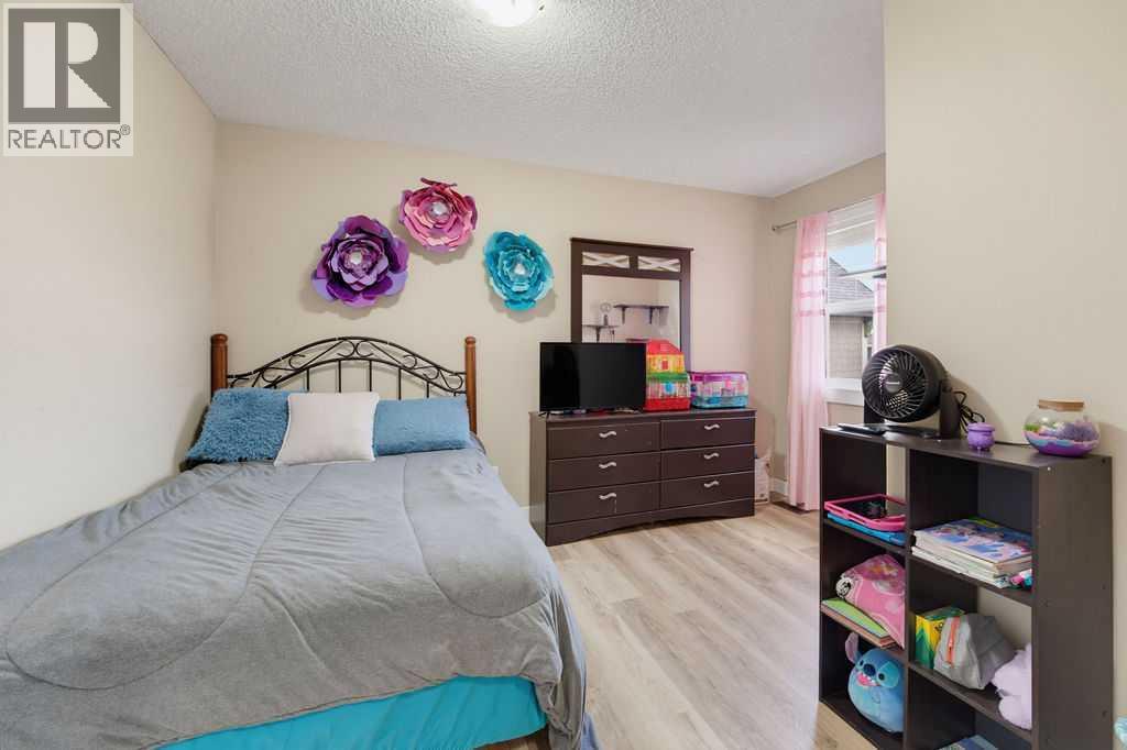 145 Sunset Manor, Cochrane, Alberta  T4C 0N2 - Photo 27 - A2327698