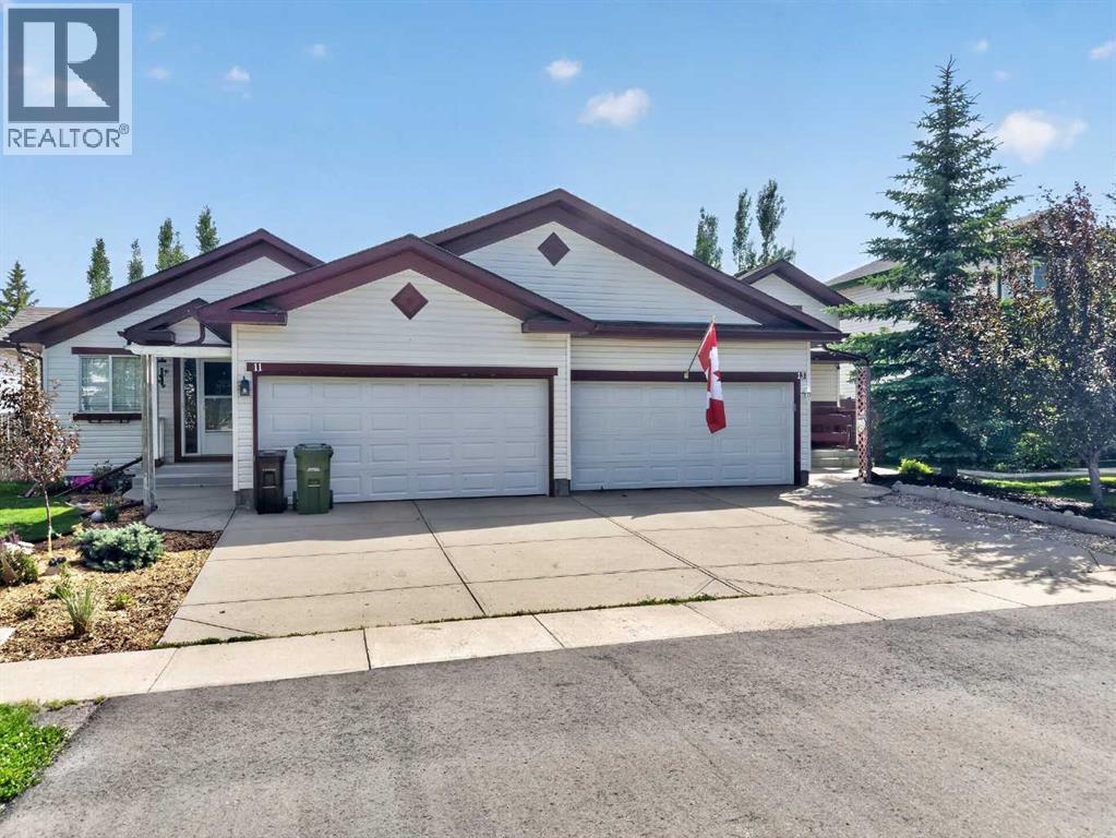 13 Canoe Close SW, Airdrie, Alberta  T4B 2N3 - Photo 2 - A2328167