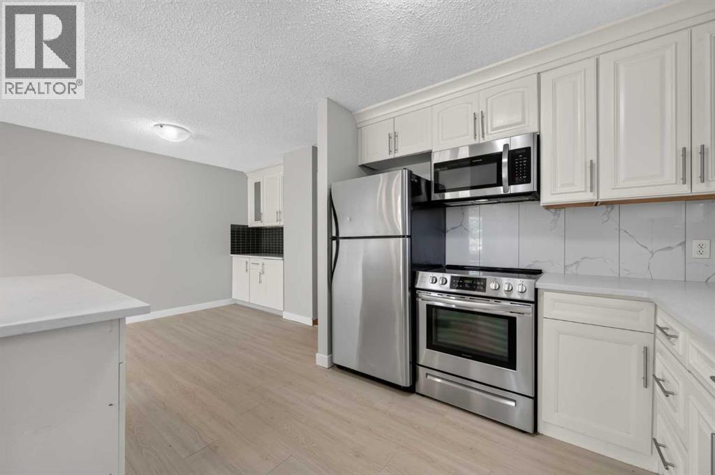 218 Bermuda Drive Nw, Calgary, Alberta  T3K 2A9 - Photo 9 - A2330540