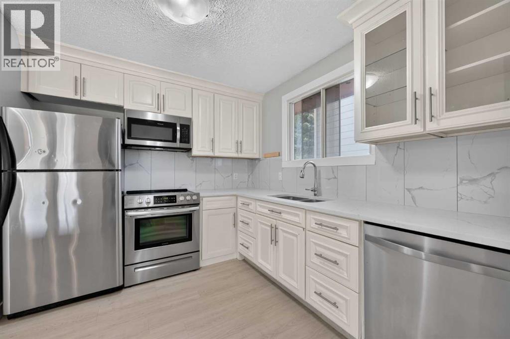 218 Bermuda Drive Nw, Calgary, Alberta  T3K 2A9 - Photo 8 - A2330540