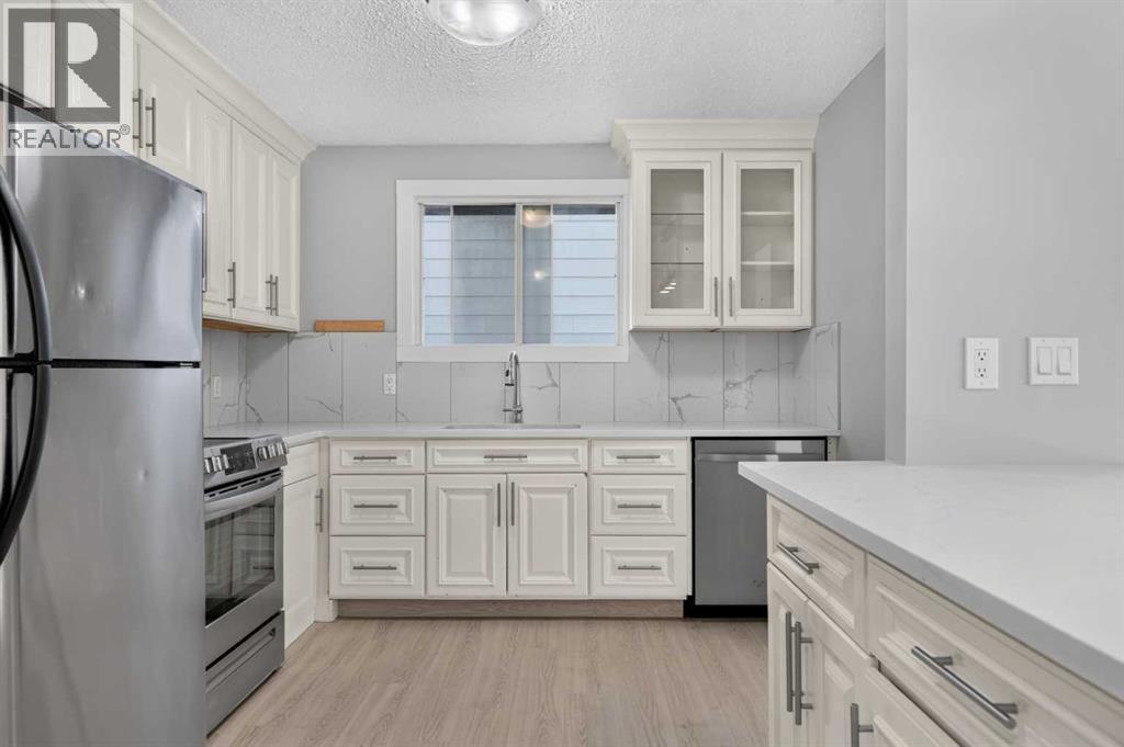 218 Bermuda Drive Nw, Calgary, Alberta  T3K 2A9 - Photo 7 - A2330540