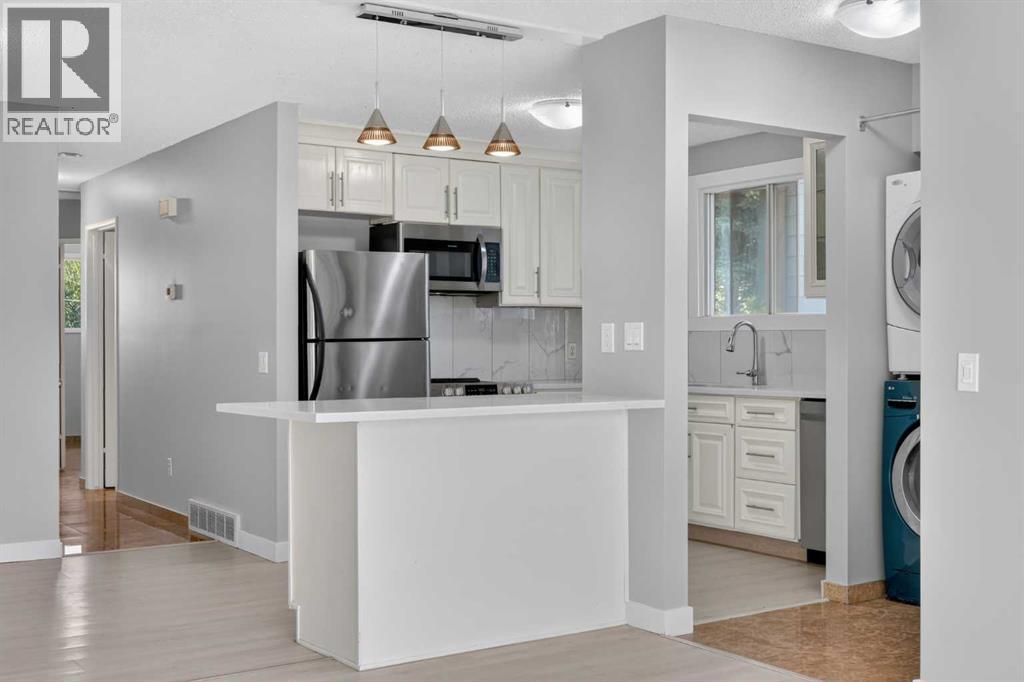 218 Bermuda Drive Nw, Calgary, Alberta  T3K 2A9 - Photo 11 - A2330540