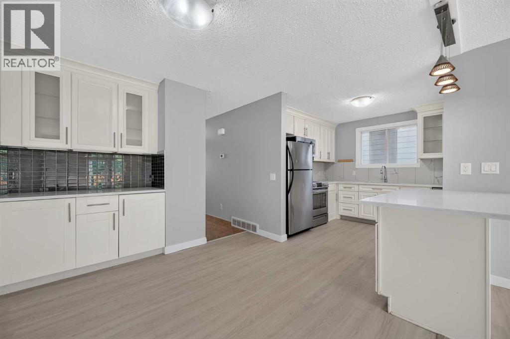 218 Bermuda Drive Nw, Calgary, Alberta  T3K 2A9 - Photo 12 - A2330540