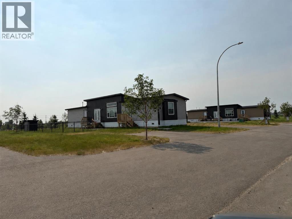 7037 & 7049 48 Street, Taber, Alberta T1G 0G7 - Photo 1 - A2331498
