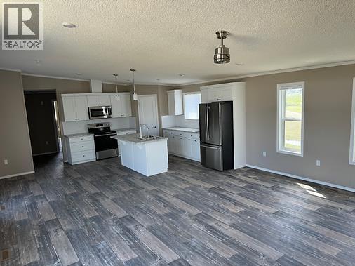 7037 & 7049 48 Street, Taber, Alberta T1G 0G7 - Photo 3 - A2331498