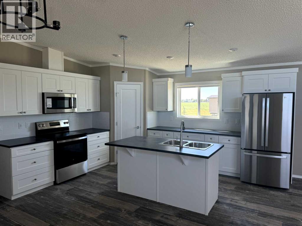 7037 & 7049 48 Street, Taber, Alberta T1G 0G7 - Photo 4 - A2331498