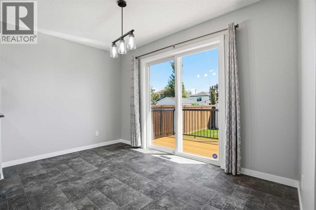 207 Sagewood Drive SW, Airdrie, Alberta  T4B 3B3 - Photo 21 - A2320262