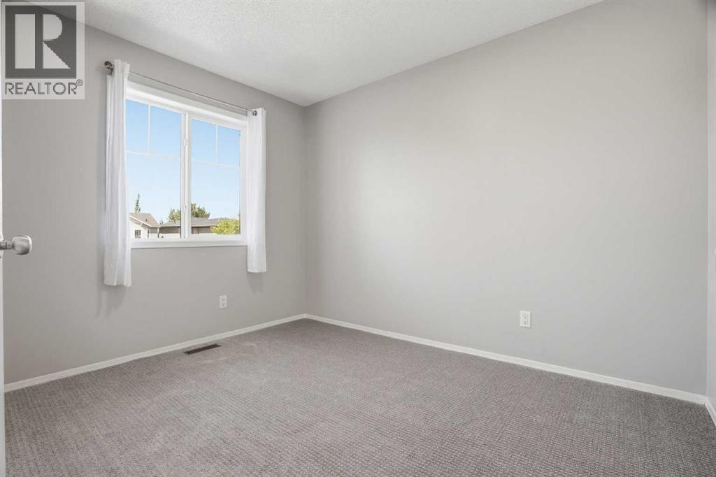 207 Sagewood Drive SW, Airdrie, Alberta  T4B 3B3 - Photo 27 - A2320262