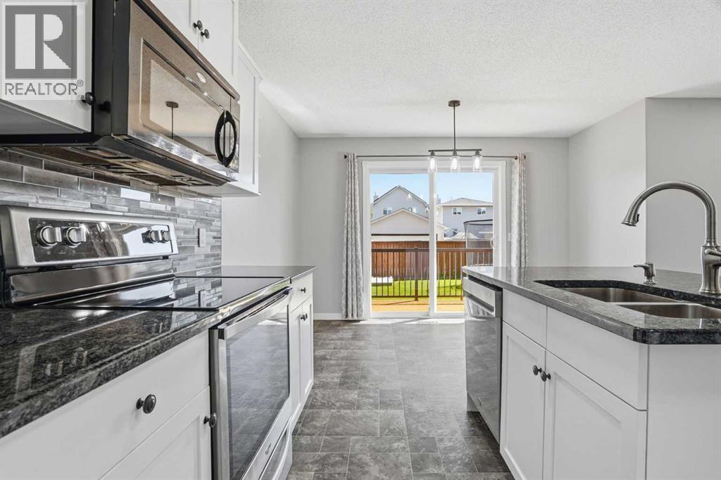 207 Sagewood Drive SW, Airdrie, Alberta  T4B 3B3 - Photo 18 - A2320262