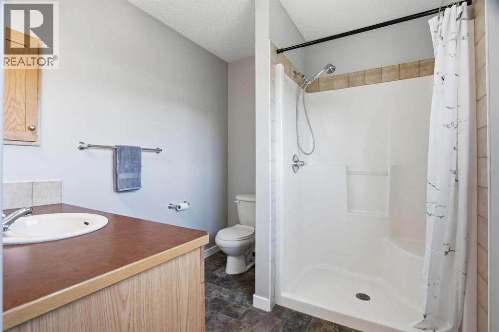 207 Sagewood Drive SW, Airdrie, Alberta  T4B 3B3 - Photo 35 - A2320262