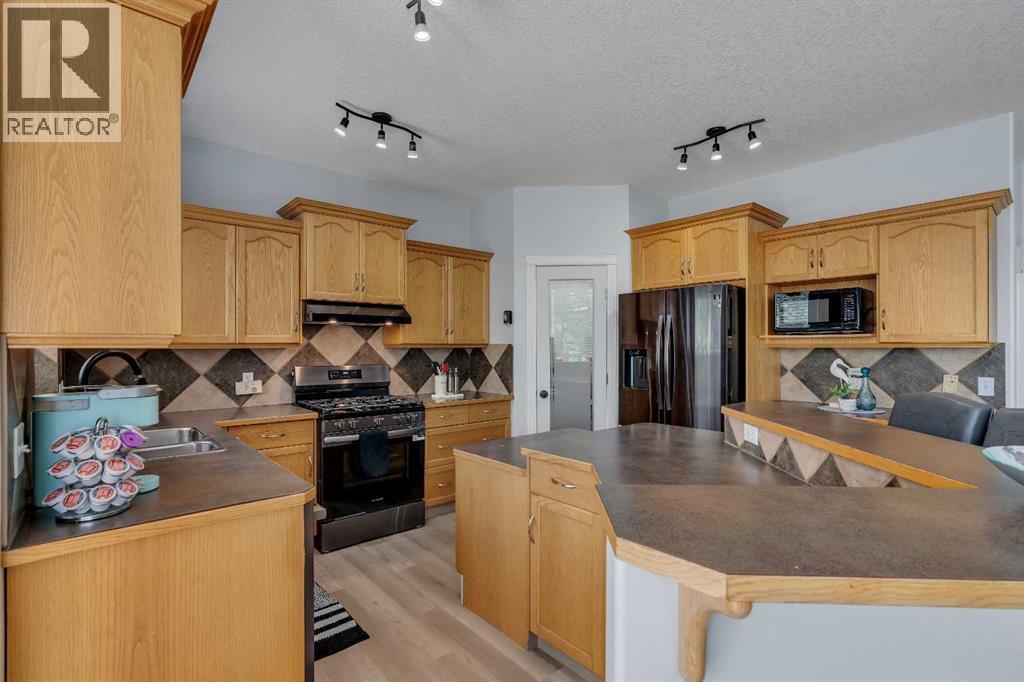 54 Thomas Street NW, Langdon, Alberta  T0J 1X2 - Photo 10 - A2329211