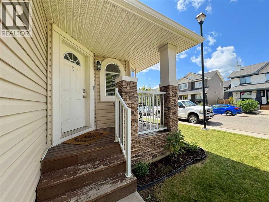 101 Channelside Cove SW, Airdrie, Alberta  T4B 3J1 - Photo 3 - A2309656