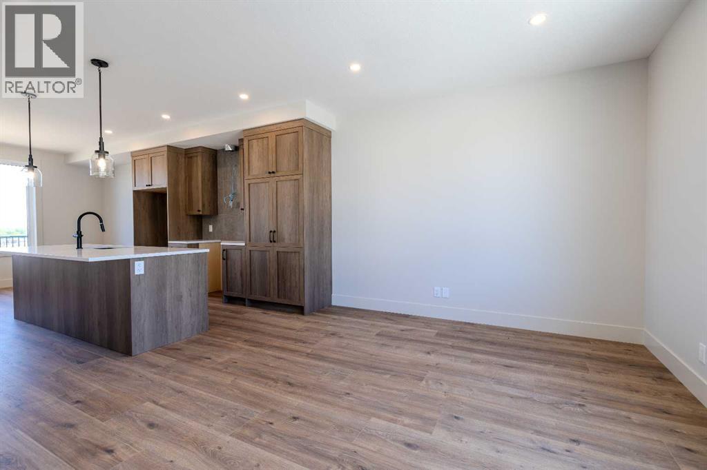 12 Tillotson Downs, Okotoks, Alberta  T1S 4Z5 - Photo 3 - A2292428