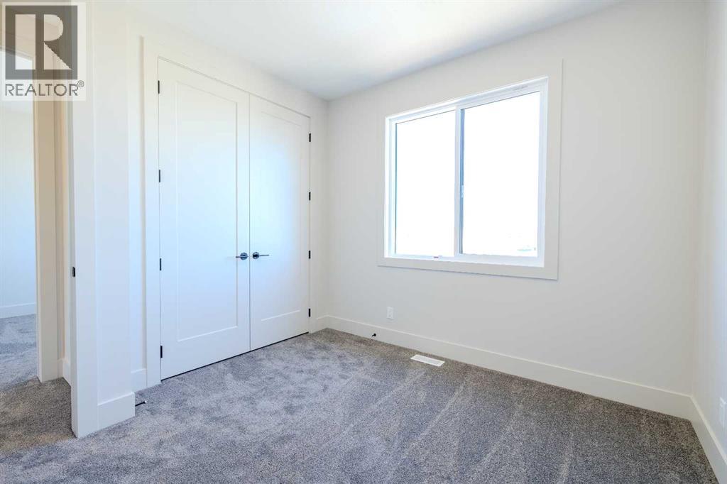 12 Tillotson Downs, Okotoks, Alberta  T1S 4Z5 - Photo 24 - A2292428