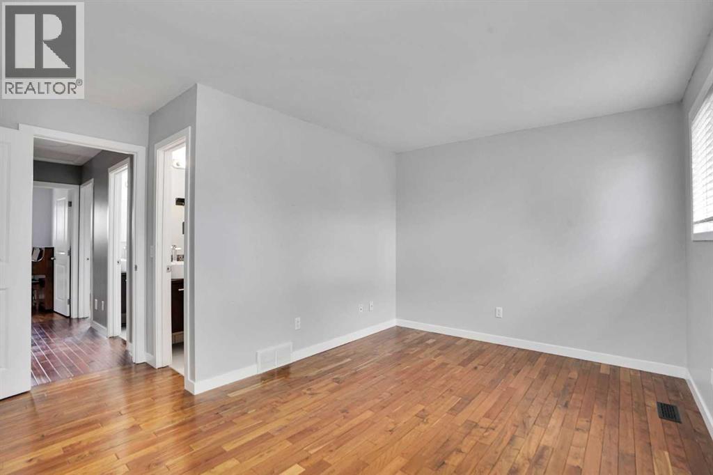 127 Woodstock Road SW, Calgary, Alberta  T2W 5W3 - Photo 18 - A2313153