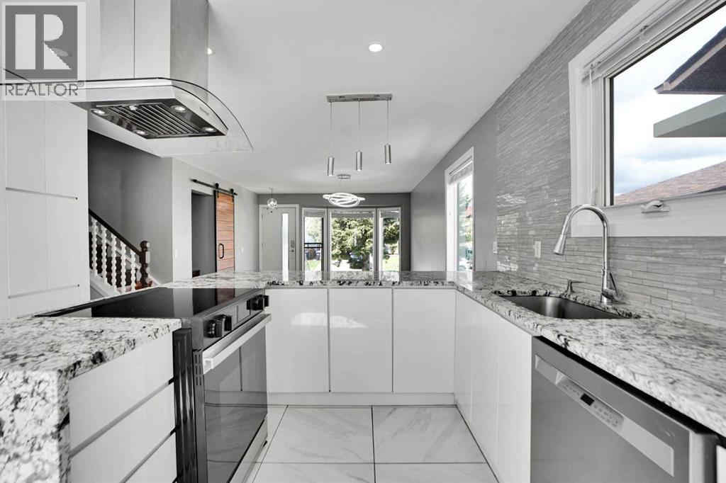 127 Woodstock Road SW, Calgary, Alberta  T2W 5W3 - Photo 11 - A2313153