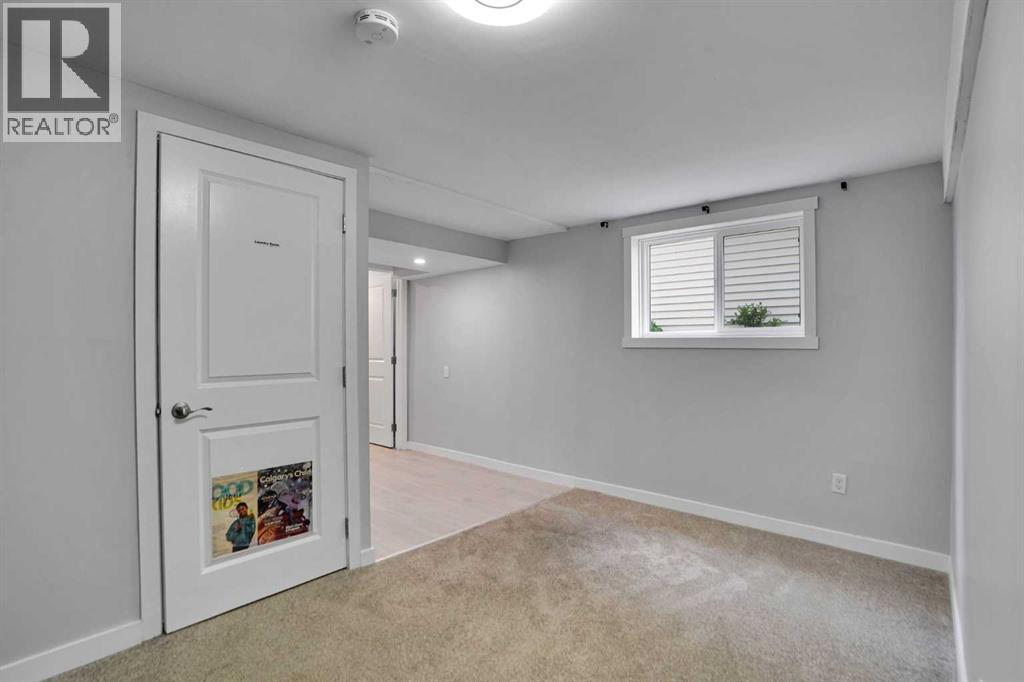 127 Woodstock Road SW, Calgary, Alberta  T2W 5W3 - Photo 31 - A2313153