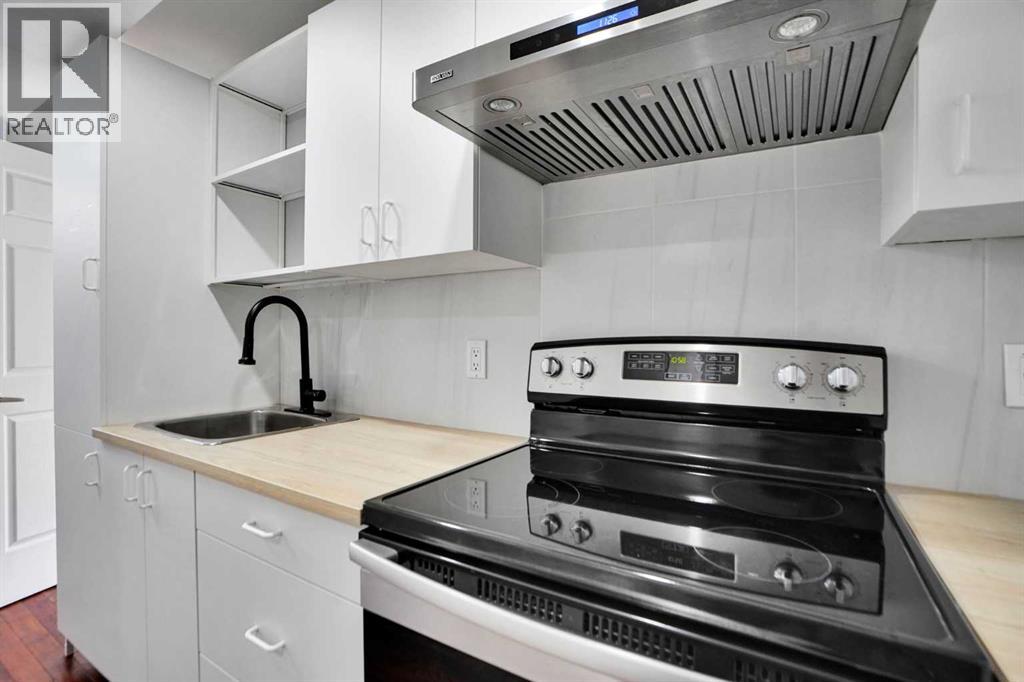 127 Woodstock Road SW, Calgary, Alberta  T2W 5W3 - Photo 30 - A2313153