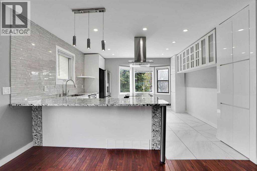 127 Woodstock Road SW, Calgary, Alberta  T2W 5W3 - Photo 8 - A2313153