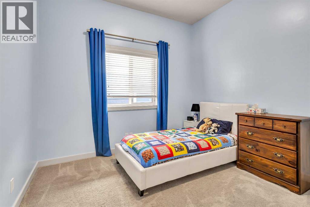 21 Evansfield Way NW, Calgary, Alberta  T3P 0L1 - Photo 19 - A2330913