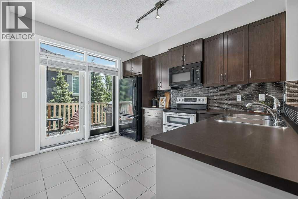 48 Kinlea Common NW, Calgary, Alberta  T3R 0S2 - Photo 17 - A2324454