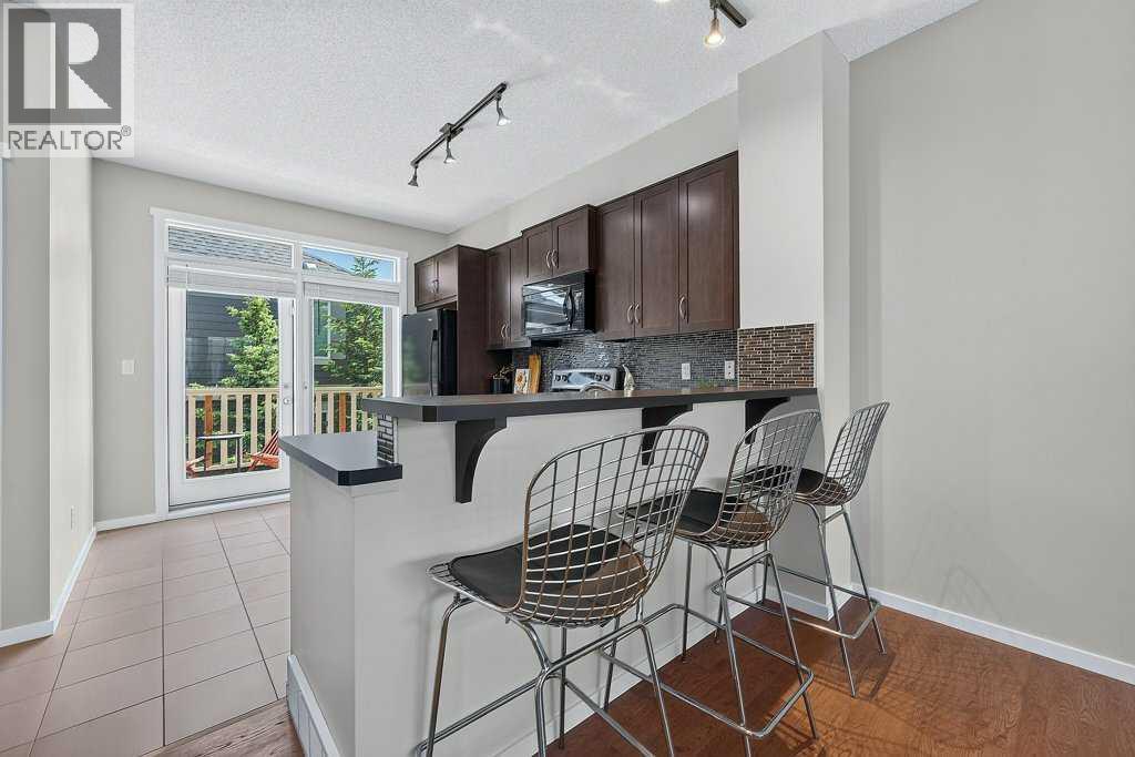 48 Kinlea Common NW, Calgary, Alberta  T3R 0S2 - Photo 3 - A2324454
