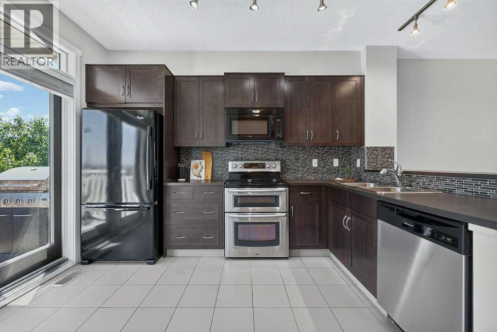 48 Kinlea Common NW, Calgary, Alberta  T3R 0S2 - Photo 19 - A2324454