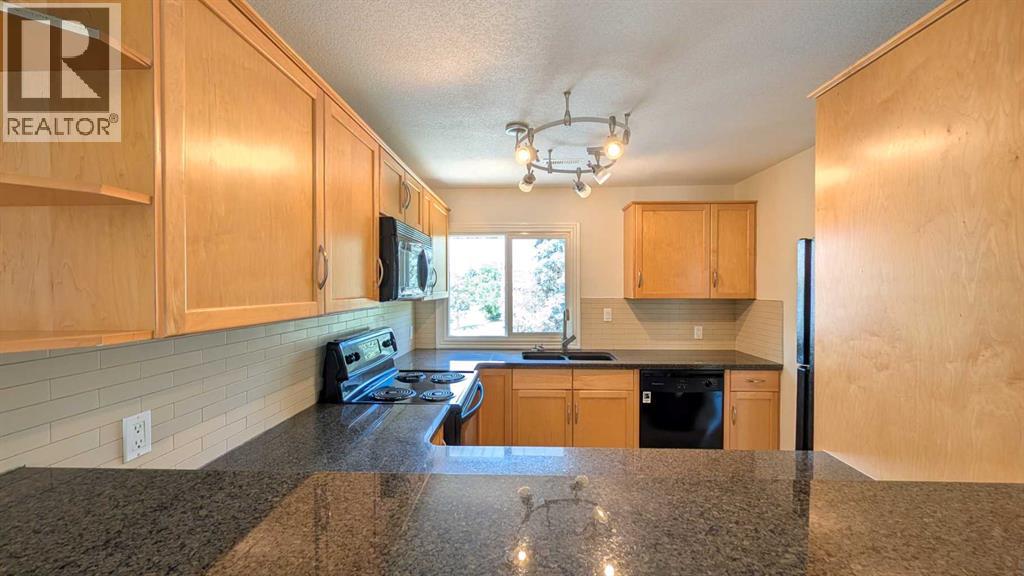 277, 86 Glamis Green SW, Calgary, Alberta  T3E 6V1 - Photo 5 - A2329773
