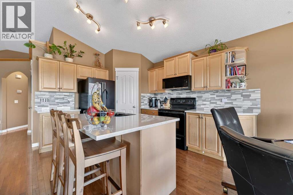 44 Bridlepost Green SW, Calgary, Alberta  T2Y 3X6 - Photo 7 - A2312111