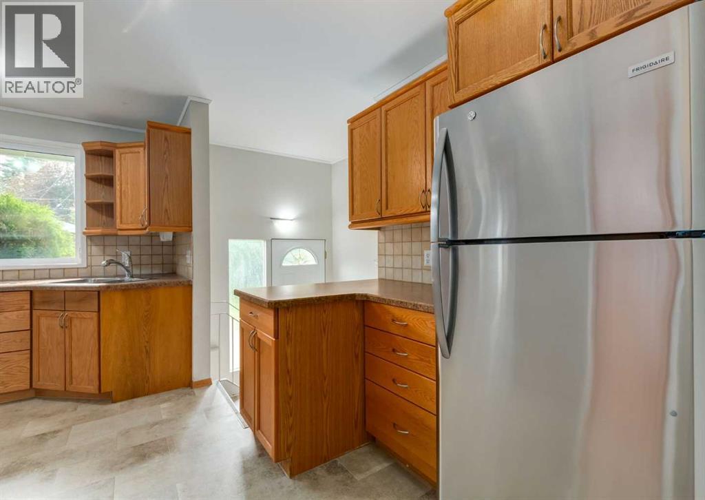 4220 Bowlen Street NW, Calgary, Alberta  T2L 1P9 - Photo 10 - A2331197
