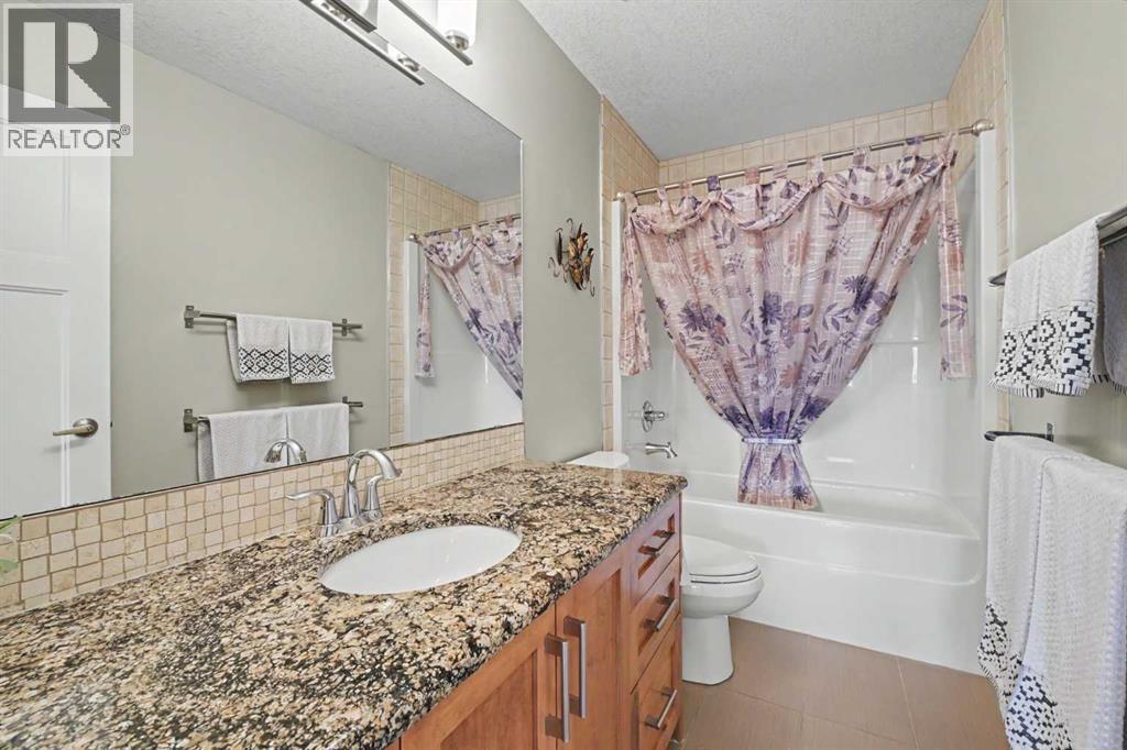 915 Coopers Drive SW, Airdrie, Alberta  T4B 2W3 - Photo 32 - A2330878