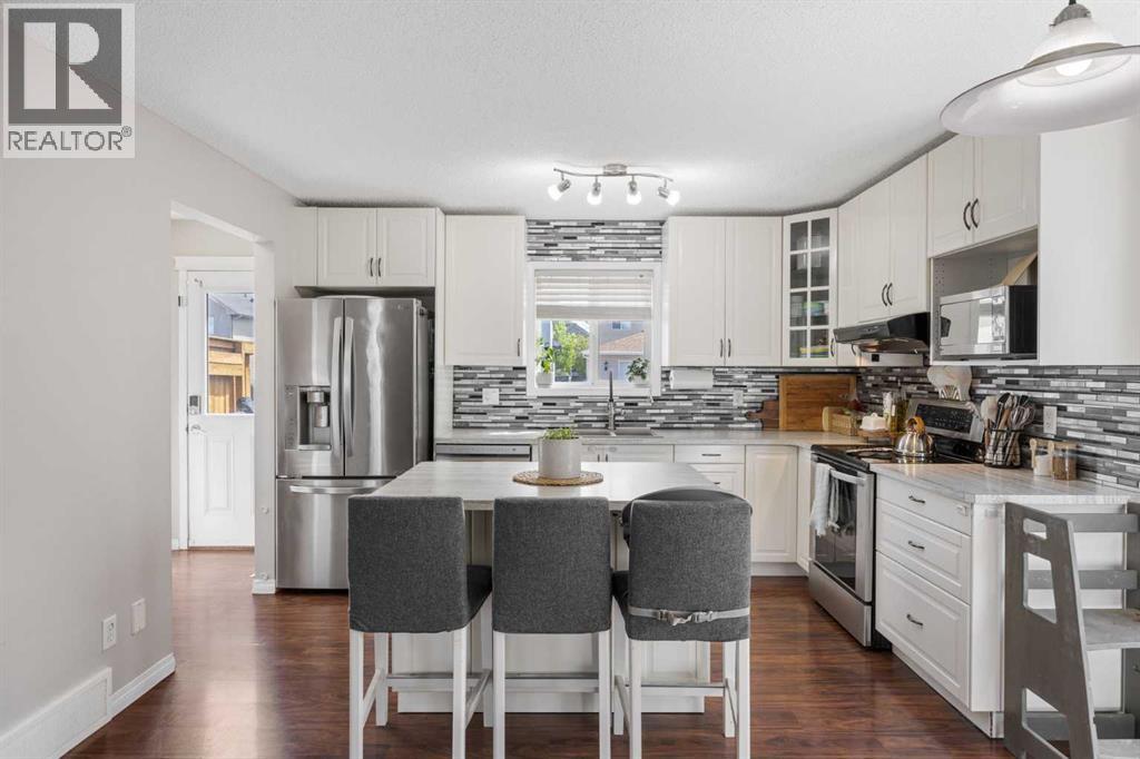 8 Cimarron Grove Rise, Okotoks, Alberta  T1S 0A6 - Photo 8 - A2313532